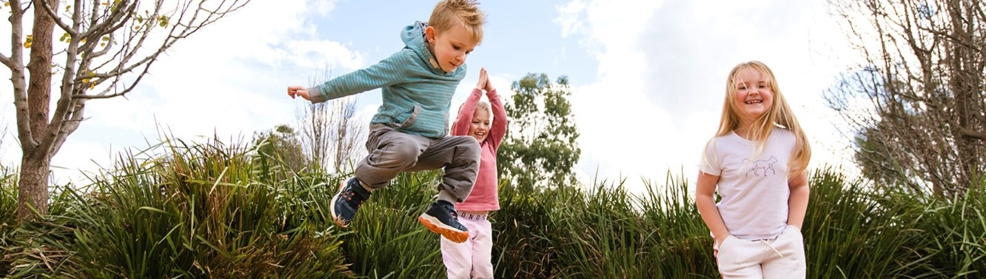 Three children in a park