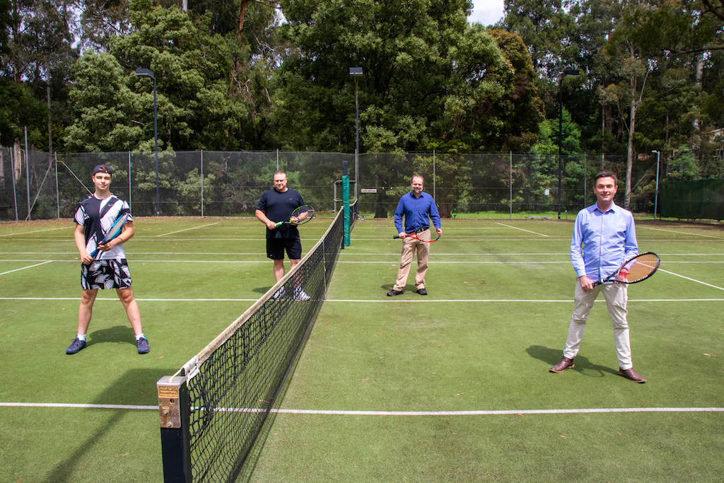 Cardinia Shire Mayor Councillor Brett Owen and Ranges Ward Councillor Jeff Springfield have a hit on the courts with Cockatoo Tennis Club’s Tom and Andrew to mark to start of four new LED lights set to be installed at the club. 