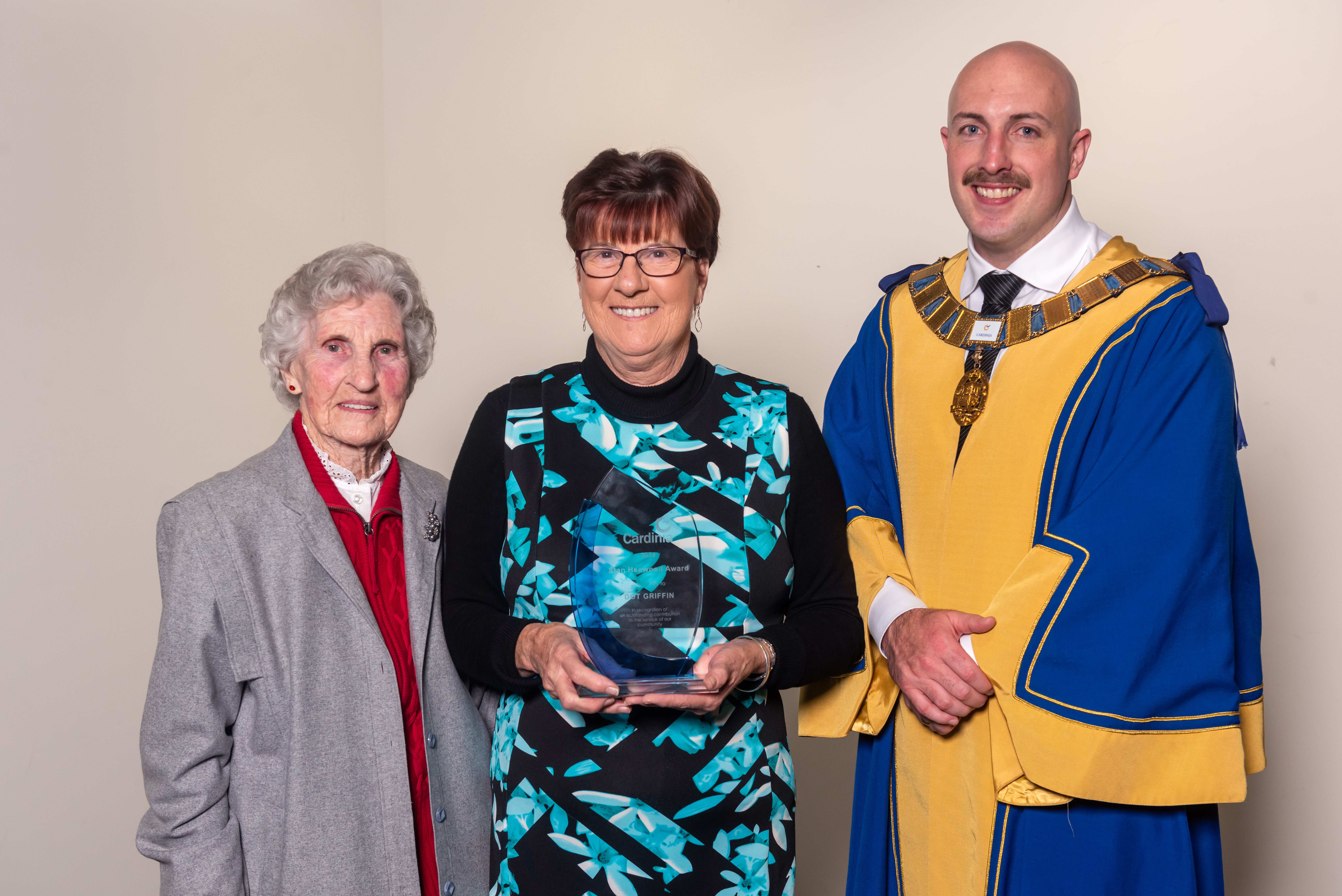 Cardinia Shire Mayor Jack Kowarzik with 2024 Stan Henwood Award winner Dot Griffin and Bev Henwood.