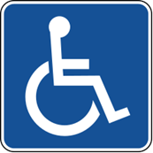 Shows a disability parking sign - which is the white outline of a person in a wheelchair on a blue background.